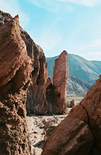 Scenic view of rock formations against sky