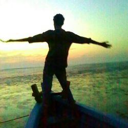 Scenic view of sea against sky at sunset