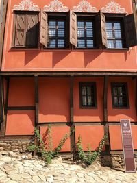 Low angle view of orange building