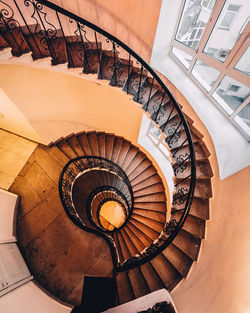 Directly below shot of spiral staircase in building