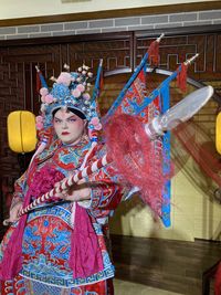 Midsection of woman in traditional clothing