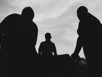 Silhouette man against sky