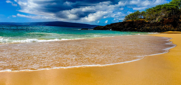 Scenic view of beach against sky, maui, hawaii