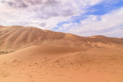 Scenic view of desert against sky