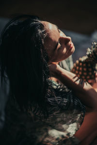 Close-up of woman looking away