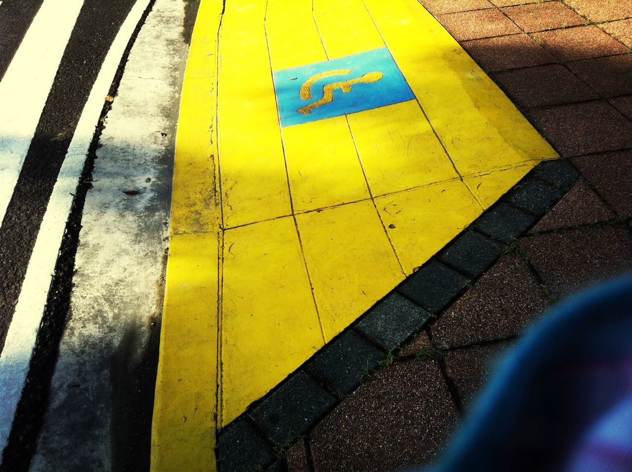 yellow, road marking, transportation, guidance, high angle view, text, communication, street, asphalt, arrow symbol, road, western script, sign, direction, close-up, directional sign, information sign, capital letter, day, no people