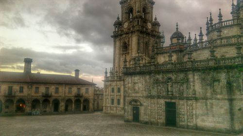 Old building against cloudy sky