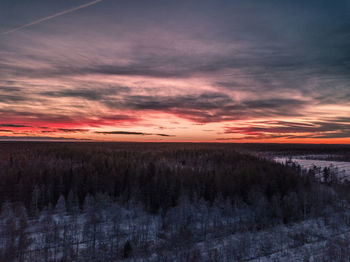 Scenic view of dramatic sky during sunset