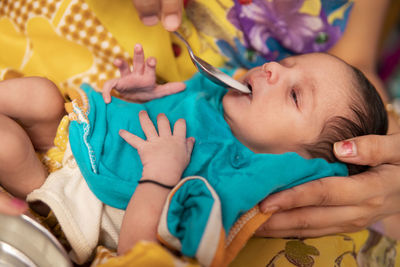 Close-up of boy playing with toy
