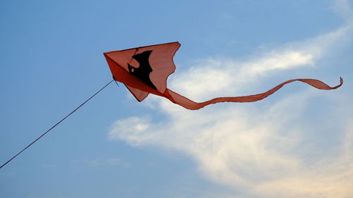 Low angle view of flag against sky