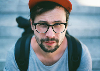 High angle portrait of mid adult man wearing eyeglasses while standing outdoors