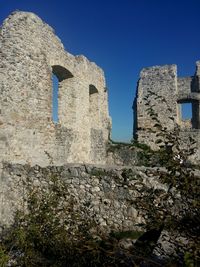 Low angle view of old ruin building