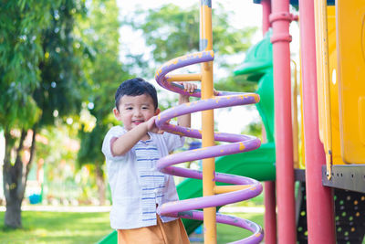 Full length of girl enjoying in playground