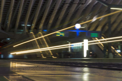 Light trails on railroad station at night