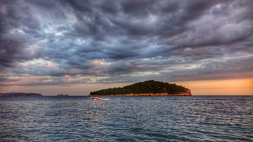 Scenic view of sea against sky during sunset