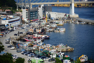 High angle view of boats moored at harbor