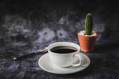 Cup of coffee on table