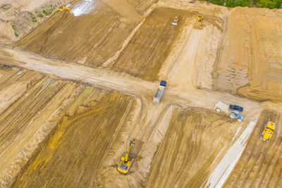 High angle view of people working at beach