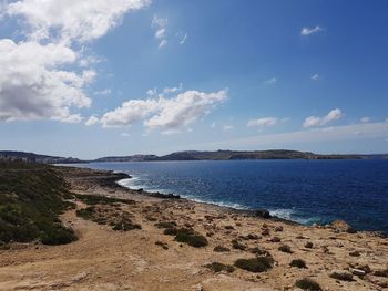 Scenic view of beach against sky