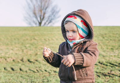 Cute girl standing outdoors