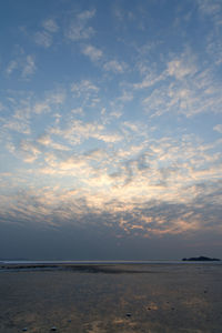 Scenic view of sea against sky at sunset