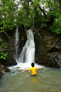 People in waterfall