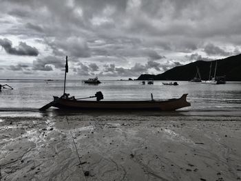 A lone fisherman boat on an evening in kuta beach, lombok island shot by the end of 2016