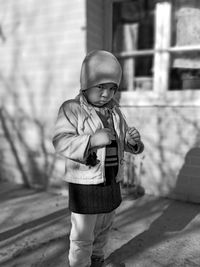 Full length of boy standing outdoors