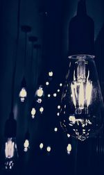 Close-up of illuminated light bulb