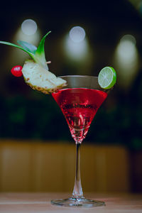 Close-up of wineglass on table