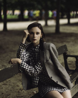 Portrait of woman sitting on seat