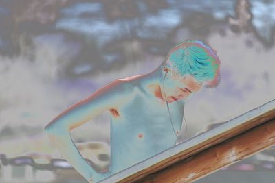 Close-up of girl swimming in water