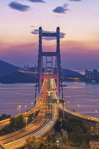 Golden gate bridge in city during sunset