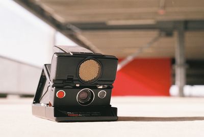 Close-up of camera on table