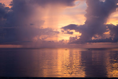 View of calm sea at sunset