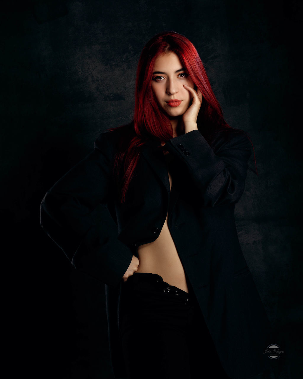 one person, adult, women, darkness, portrait, redhead, young adult, fashion, dyed red hair, red, clothing, looking at camera, black, studio shot, hairstyle, dark, indoors, female, long hair, black background, elegance, standing, arts culture and entertainment, emotion, photo shoot