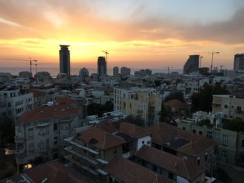 View of cityscape at sunset