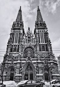 Low angle view of bell tower against sky