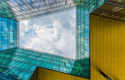 Low angle view of modern building against sky