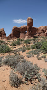 Rock formations in desert against sky