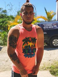 Young man wearing sunglasses standing outdoors