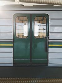 Train with closed doors at railroad station