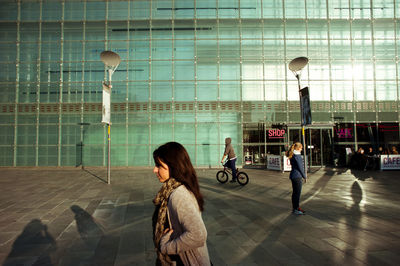 Woman standing in city