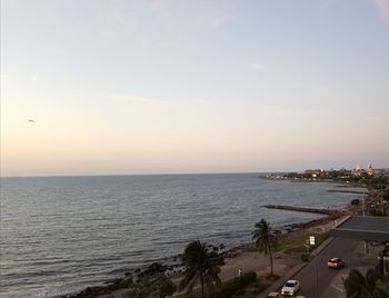 Scenic view of sea against sky at sunset