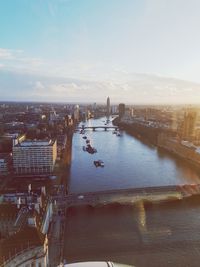 High angle view of city at riverbank