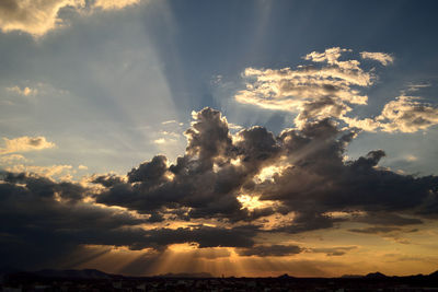 Low angle view of clouds in sky during sunset