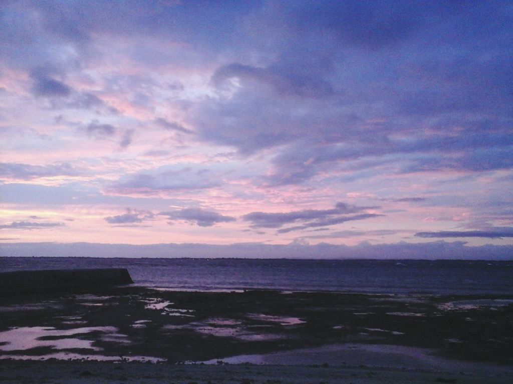 water, sunset, sea, sky, tranquil scene, scenics, tranquility, beauty in nature, cloud - sky, horizon over water, nature, idyllic, beach, cloud, shore, cloudy, orange color, outdoors, dusk, remote