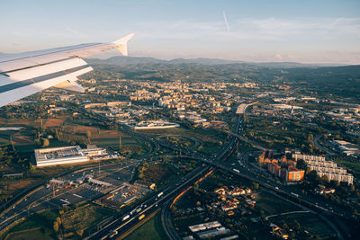 High angle view of city and buildings against sky