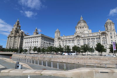 Buildings against blue sky in city