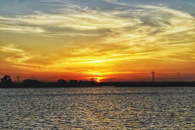 Scenic view of sea against sky during sunset